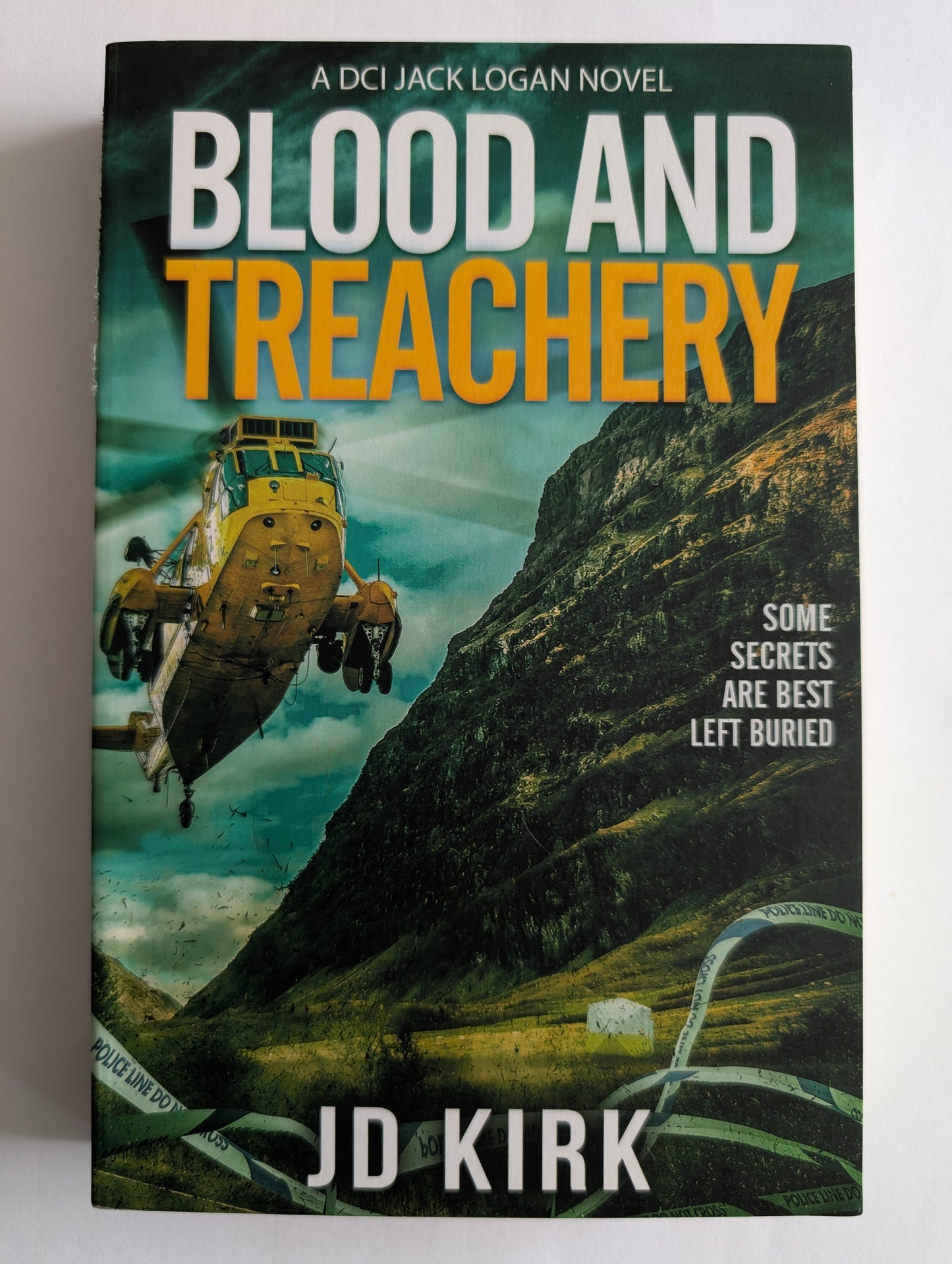 Book cover of 'Blood and Treachery' by J.D. Kirk with a space ship and mountain scene.