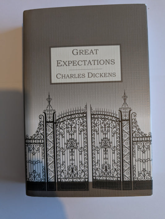Book titled 'Great Expectations' by Charles Dickens with decorative cover design.