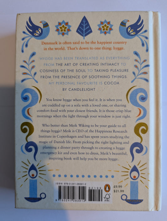 Back cover of a book with decorative elements and text on a white background