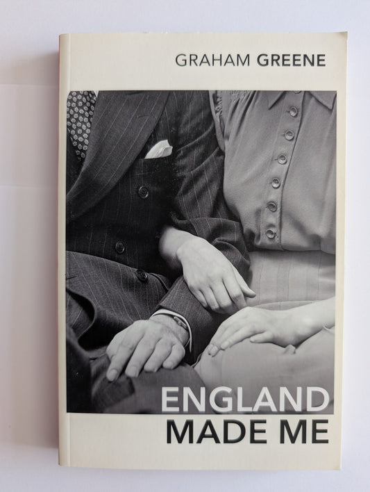 Book cover of 'Made Me England' by Graham Greene with a black and white photo of two people on a beige background.