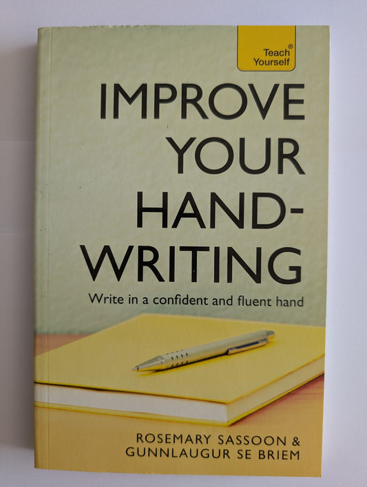 Book cover of 'Improve Your Writing Hand' with a pen and yellow label on a white background