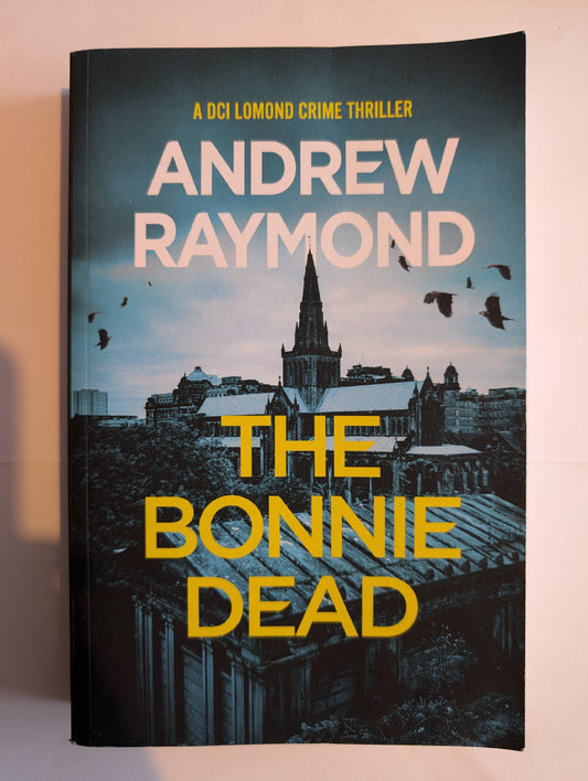 Book cover of 'The Bonnie Dead' by Andrew Raymond with a cityscape and silhouette design.