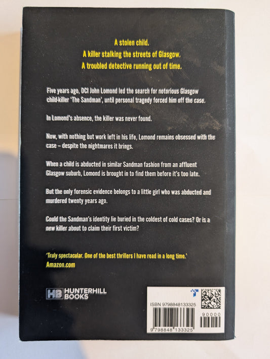 Back cover of a book with text and a barcode on a light background