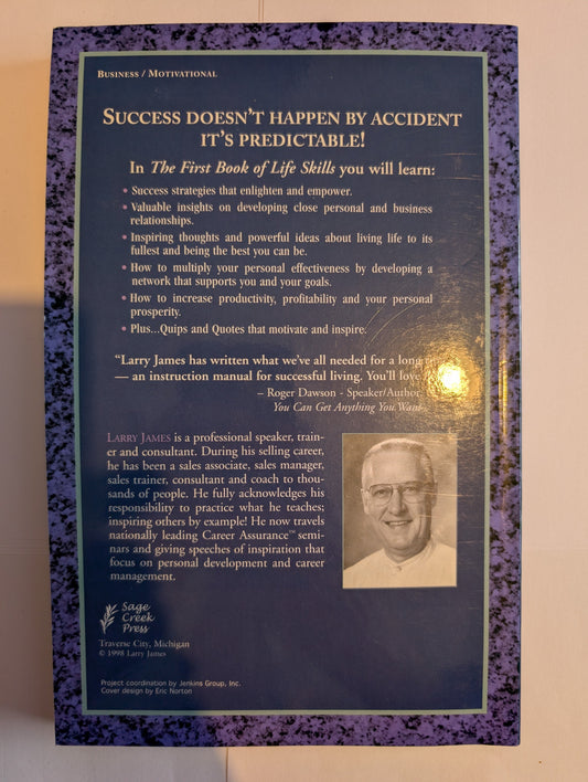 Decorative book with purple and blue design on a plain background