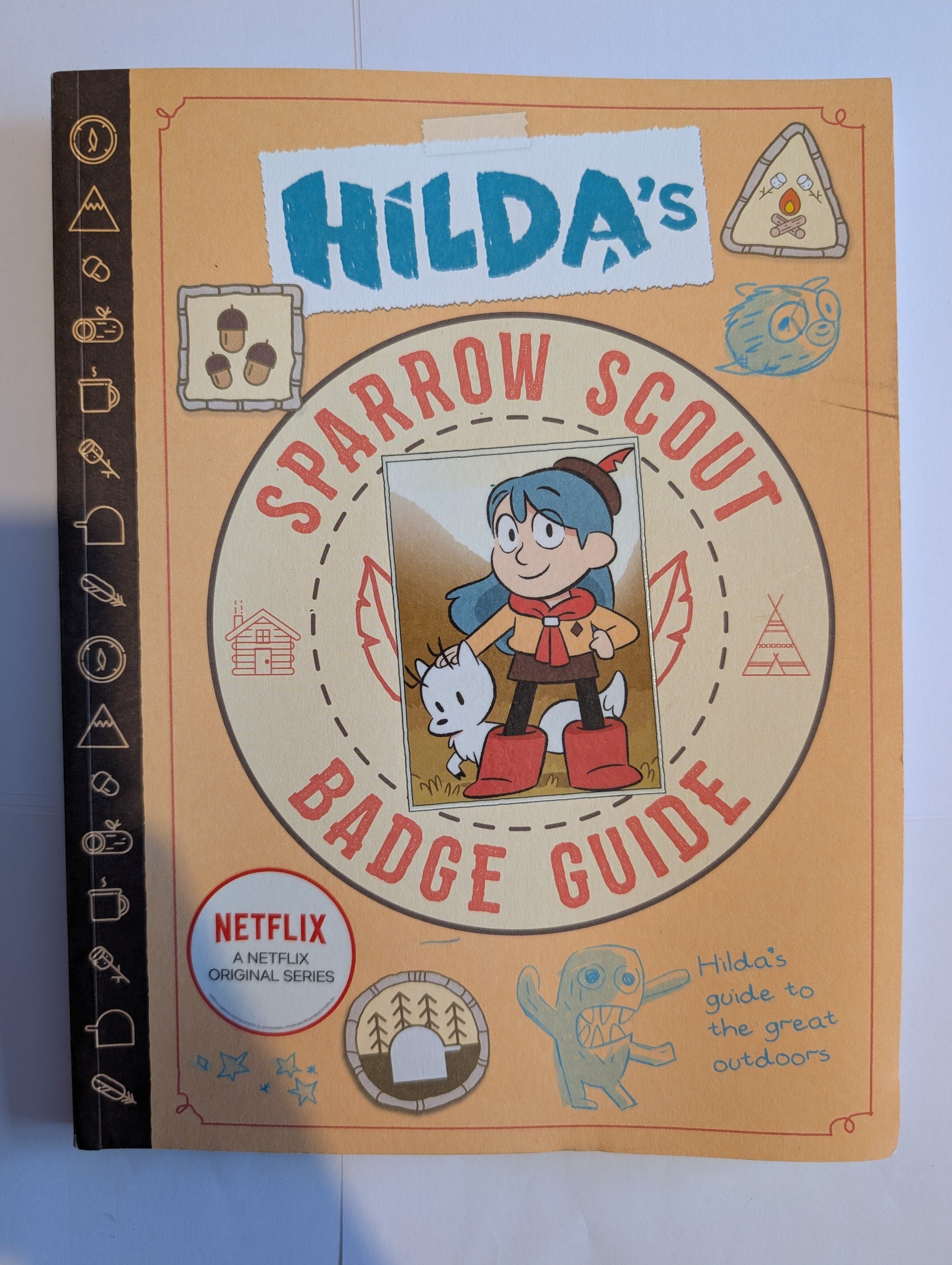 Book cover with cartoon character and text on a white background